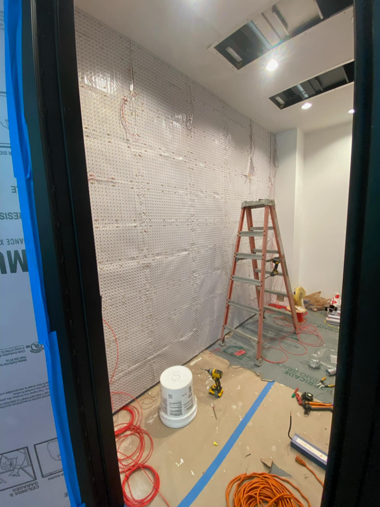 Electrical wiring installation in a room under construction by Focal Electric Company in Dallas, TX.