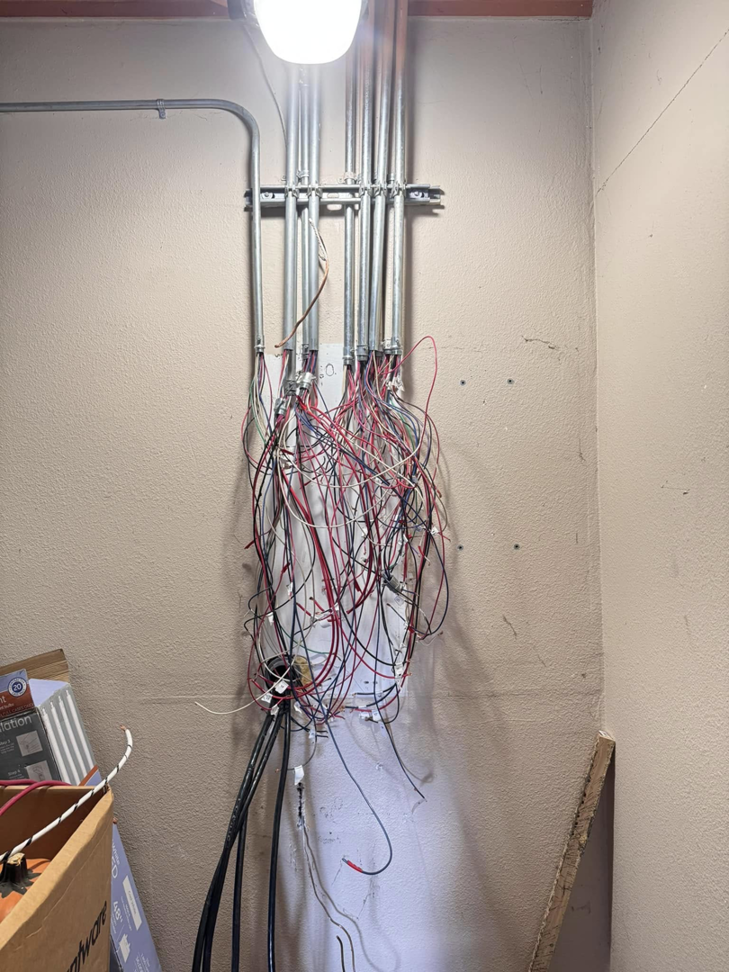 Electrical wiring installation in progress with conduits and wires by OCD Electric in Spokane, WA.