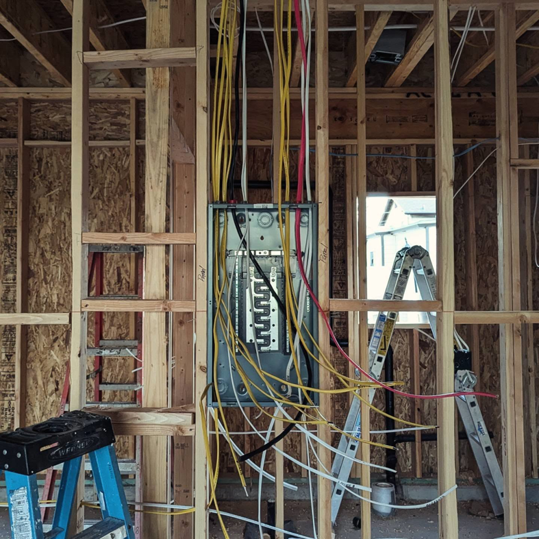 An open electrical panel showing extensive wiring during an installation project by Lara Electric in Miami, FL.