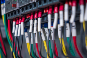 Close-up of electrical wiring and a panel, showing detailed connections by ZAP Electric LLC in Greeley, CO.