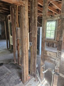 Exposed electrical wiring and boxes during renovation by HLR Electric Company, LLC in Durham, NC.