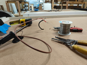 Close-up of electrical wiring and soldering tools used by Bright Electric in Evansville, IN.