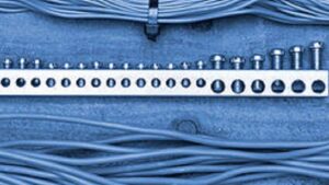 Close-up of electrical wiring connected to a terminal block, showcasing the detailed work by Legacy Electric in Westminster, CO.