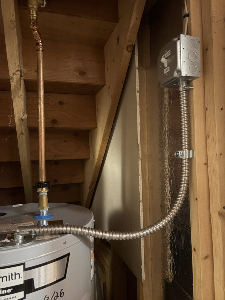 Electrical wiring and conduit installation for a water heater by Dartmouth Fire Protection Electrical Division in New Bedford, MA.