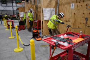 An electrician bending electrical conduit with a bender at MetroPower, Inc. in Albany, GA.
