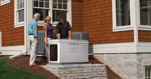 An electrician from Braco Generators consulting with customers about a generator installation in O'Fallon, MO