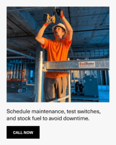 An electrician drilling conduit overhead in a commercial building for Redbone Electrical Contractors in Oklahoma City, OK.