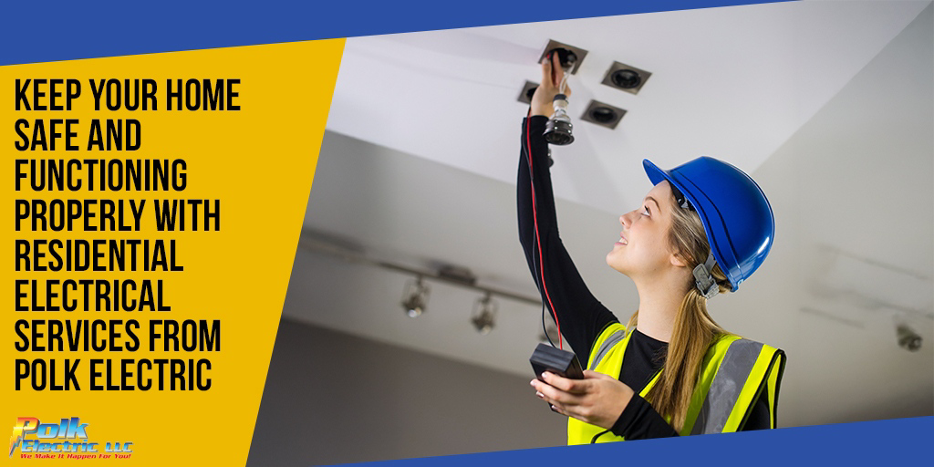 A female electrician installing or checking recessed lighting in a ceiling for Polk Electric, LLC in Rock Hill, SC