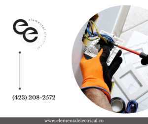 An electrician from Elemental Electrical installing wiring for an outlet in Chattanooga, TN.