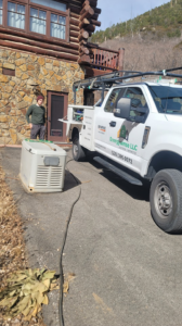 An Energysense llc electrician service truck on site for a generator installation job in Tucson, AZ.