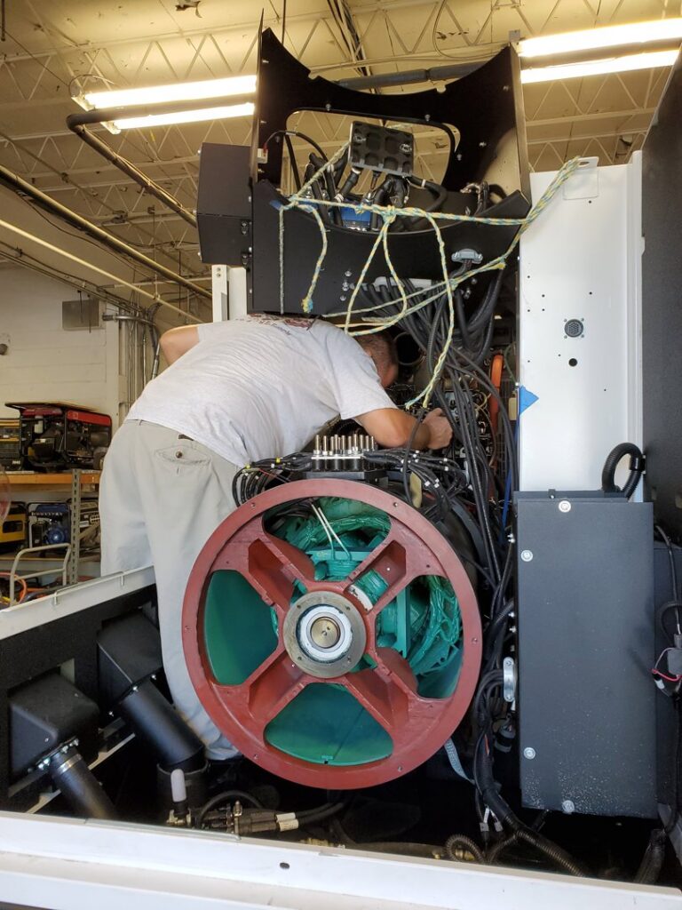 An electrician from Bay Electric Co. servicing industrial electrical equipment in Newport News, VA.