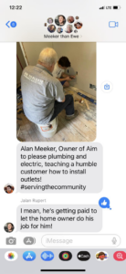 An electrician from AIM to Please Plumbing & Electric teaching a customer how to install electrical outlets in Bloomington, IN.