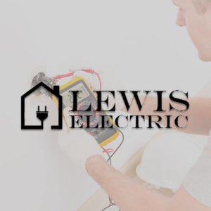 An electrician from Lewis Electric testing electrical wiring with a multimeter in Macon, GA