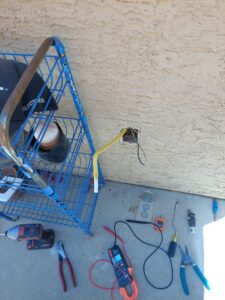 Electrician tools and exposed wiring during a job by GET LIT Electrical Services LLC in Glendale, AZ.