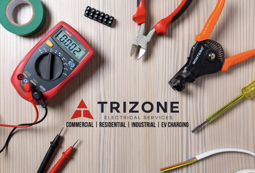 Electrician tools like a multimeter, wire strippers, and pliers, showcasing Trizone Electric's services in Houston, TX.