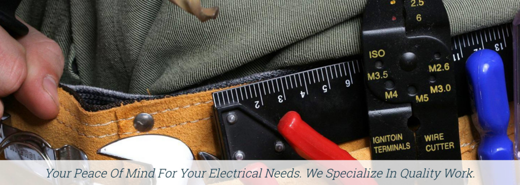 Electrician's tools, including wire strippers and cutters, in a tool belt from Rockhill Electrical Systems in Colorado Springs, CO.