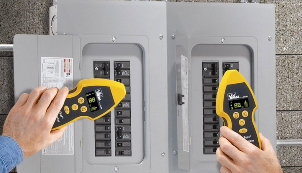 An electrician using a circuit breaker finder on an electrical panel for OMR Electrical Contractors Inc. in Cape Coral, FL.