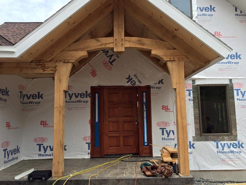 An electrician installing wiring in a framed wall during new construction by Cannizzo Electric, Inc. in Rochester, NY.