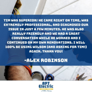 An electrician from APT Electric working on electrical components with tools in Chesterland, OH.