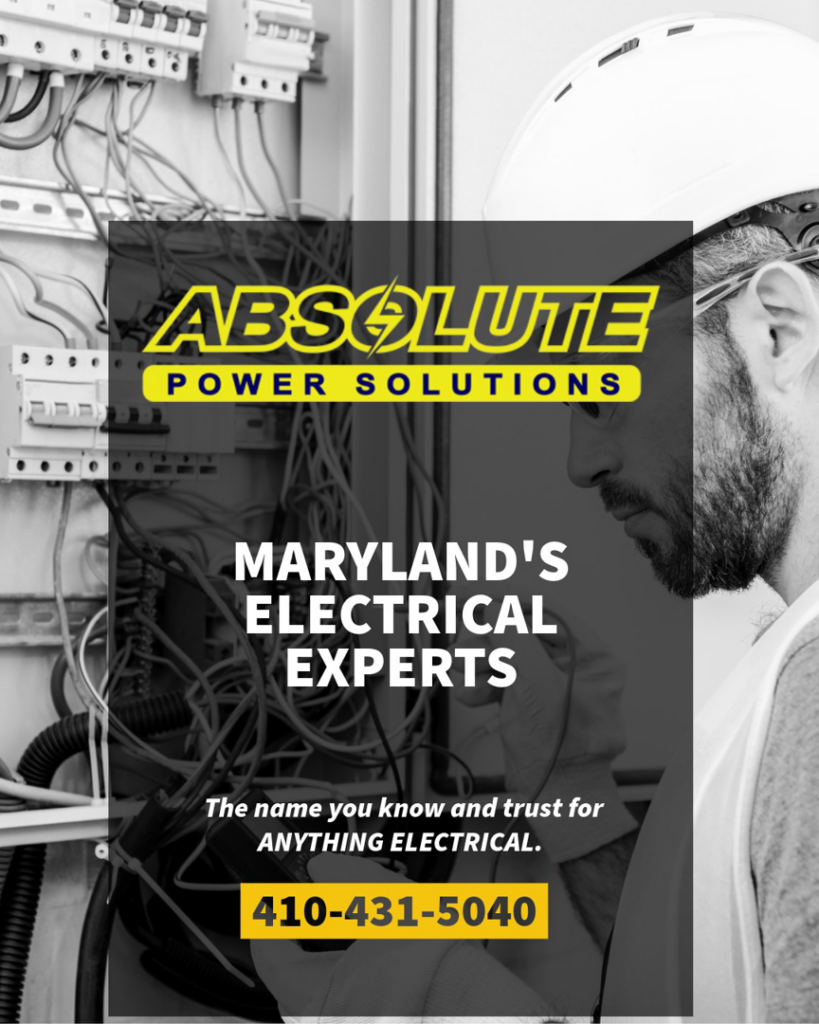 An electrician working on an electrical panel for Absolute Power Solutions USA in Annapolis, MD.