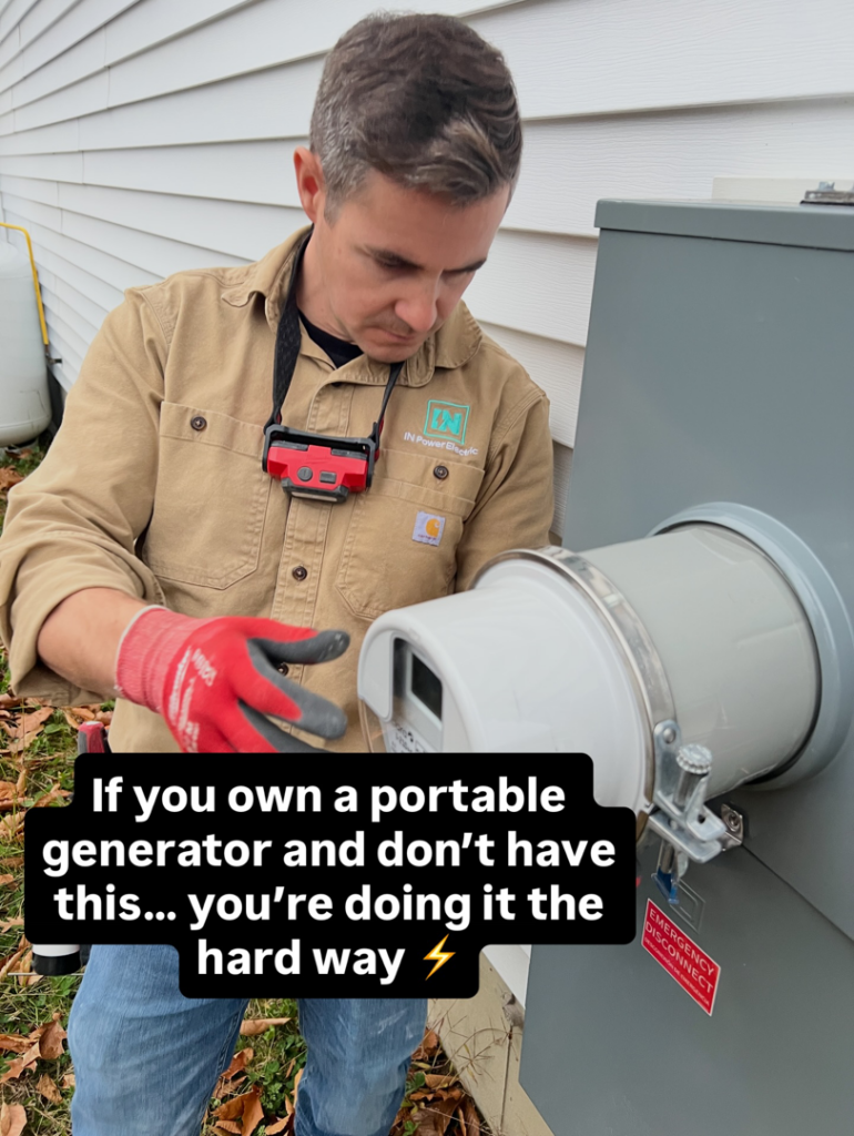 An electrician from IN Power Electric working on a generator transfer switch installation in Gorham, ME