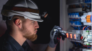 An electrician working on an electrical panel with a voltage tester for All American Pro Electric LLC in Cedar Creek, TX.