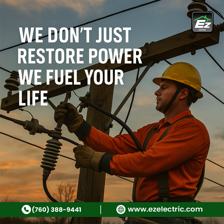 An electrician working on power lines on a utility pole for EZ Electric in San Diego, CA