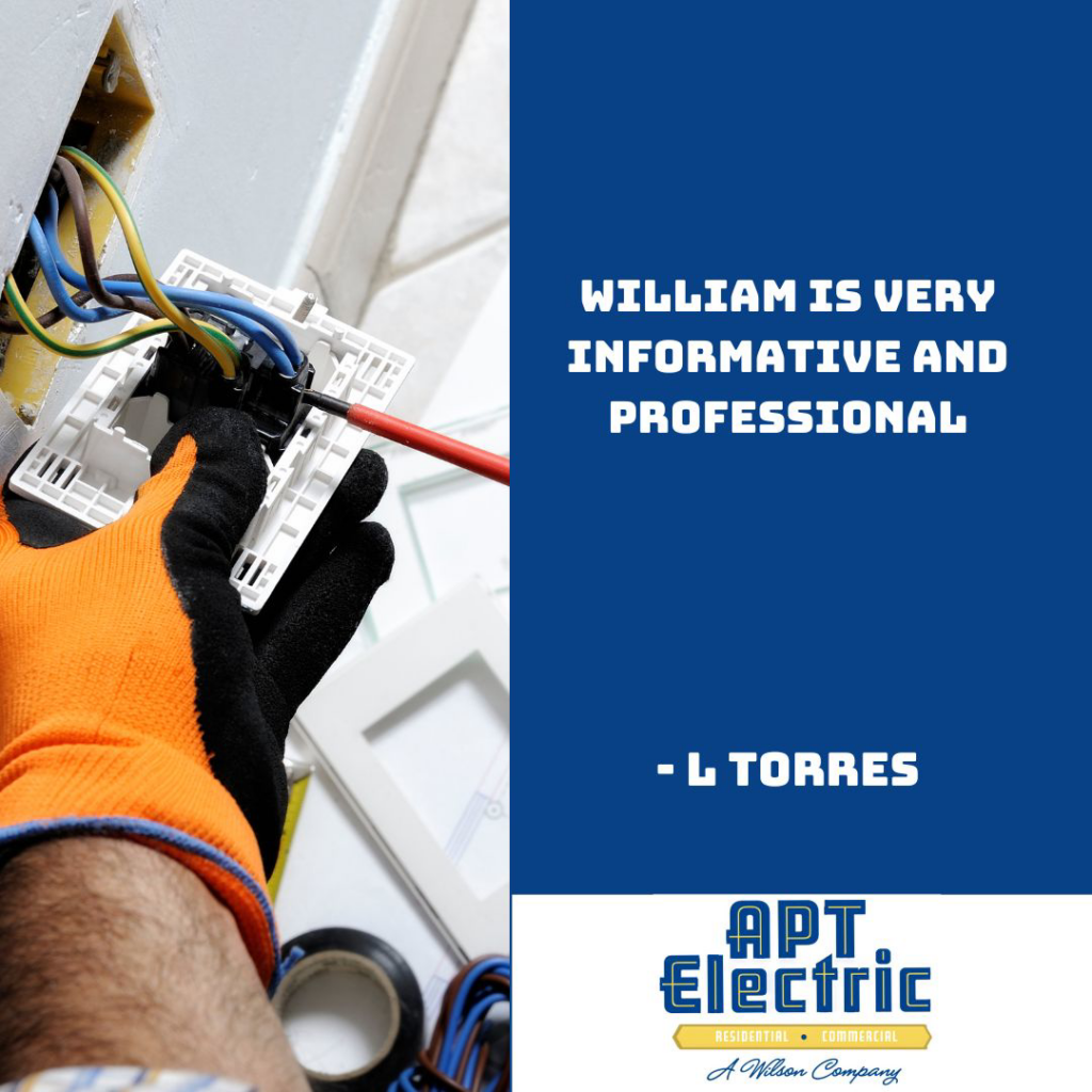 An electrician from APT Electric working on electrical wiring with a screwdriver in Chesterland, OH.