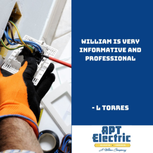 An electrician from APT Electric working on electrical wiring with a screwdriver in Chesterland, OH.