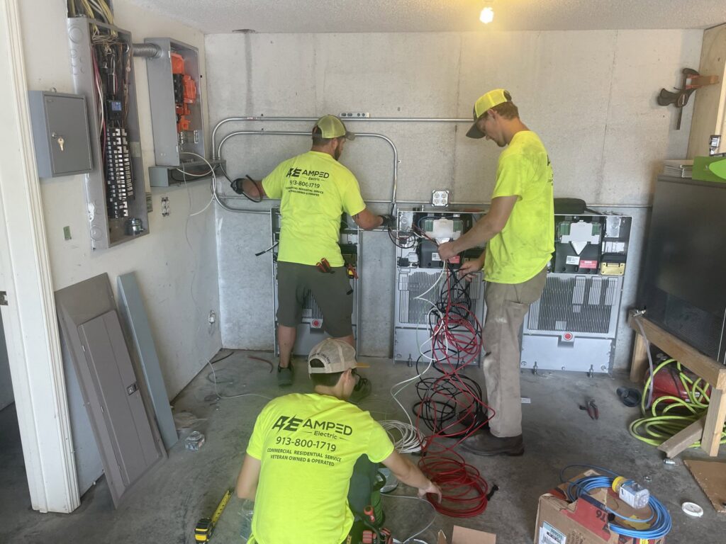 Amped Electric electricians installing electrical panels and complex wiring in Virginia Beach, VA.