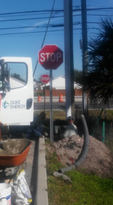 Electricians installing underground electrical conduits for Electrical Partners of Central Florida in Altamonte Springs, FL
