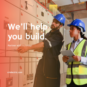 Electricians working on a commercial electrical panel for CRI Electric in Anaheim, CA.