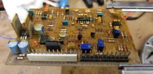 Close-up of an electronic circuit board with various components, showcasing detailed electrical work by J&L Electric Inc. in San Antonio, TX