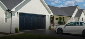 An elegant black residential garage door installed by Chase Door Systems in Summerville, SC.