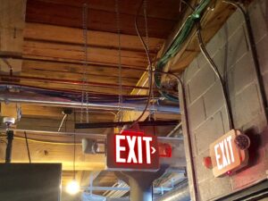 Emergency exit signs and lighting installed in a commercial building by Detroit Voltage in Detroit, MI.