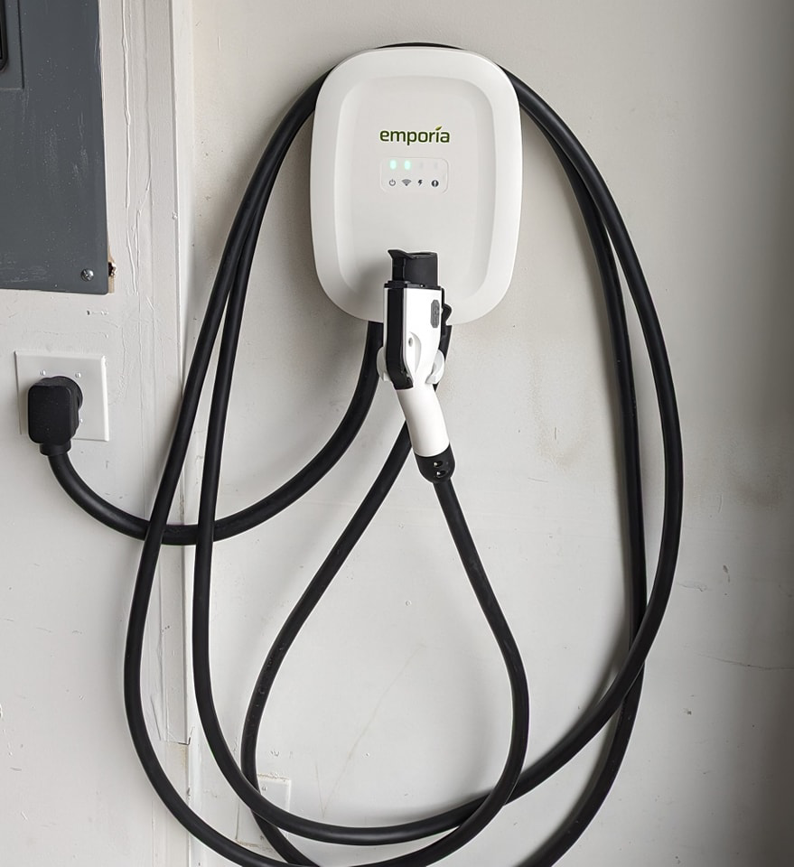 An Emporia electric vehicle charger professionally installed on a garage wall by Alt Electric LLC in Federal Way, WA.