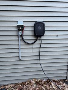 An Emporia EV charger installed on the exterior of a home by Ramos Electrical services inc in Brownsville, TX