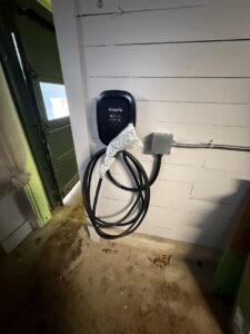 An Emporia EV charger installed on a wall, ready for use, by Rockys electric in La Junta, CO.