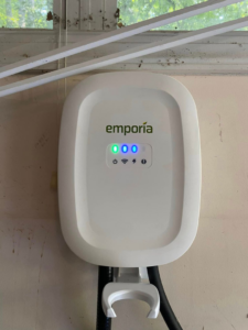 An installed Emporia EV charger, a service provided by Weiss Electric LLC in Saint Charles, MO.