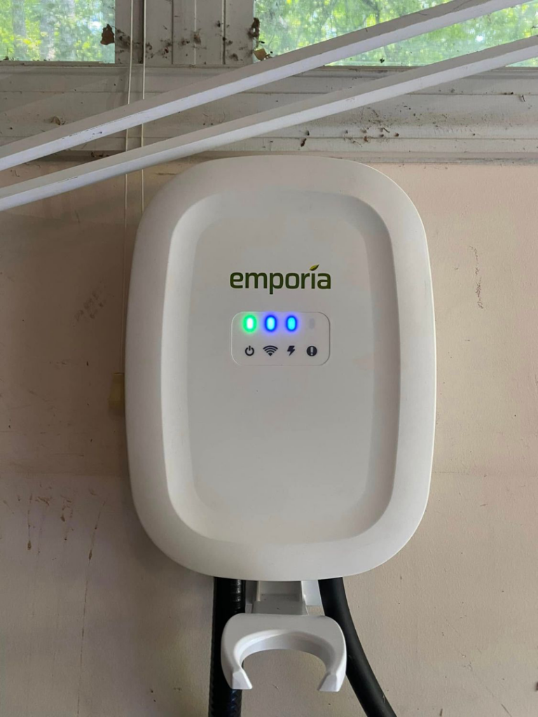 An installed Emporia EV charger, a service provided by Weiss Electric LLC in Saint Charles, MO.