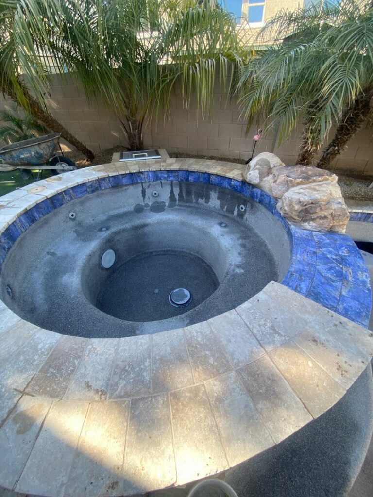 An empty hot tub or spa, ready for cleaning or repair service by Cruz pool service and repair in Lees Summit, MO