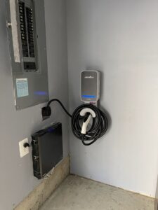 JuiceBox EV charger and electrical panel installation by Armenergo Electrician in Rockville, MD