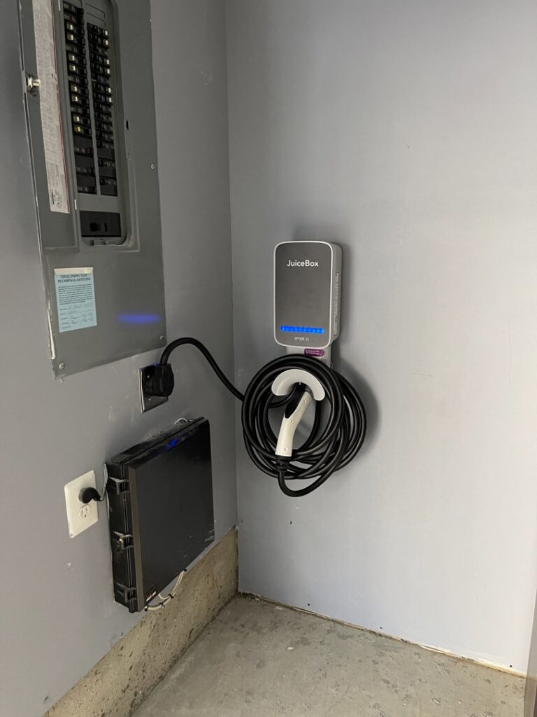JuiceBox EV charger and electrical panel installation by Armenergo Electrician in Rockville, MD
