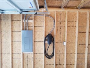 Electric vehicle charging station and electrical panel installation by Electrifying Services in Indianapolis, IN