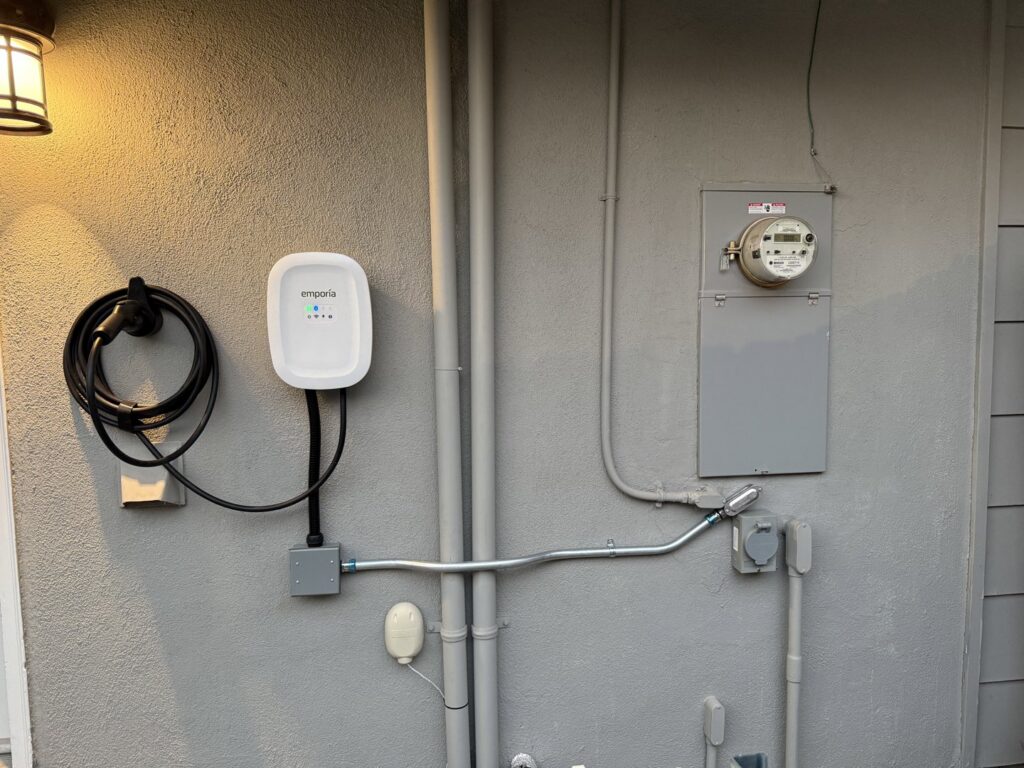 An outdoor electric vehicle charger and electrical panel installation by Fuse Service HVAC & Electrical Sacramento, CA