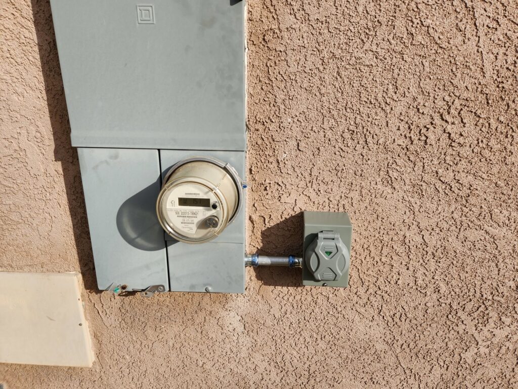 Outdoor electrical meter and EV charger connection installed by B&C Electric LLC in Bakersfield, CA