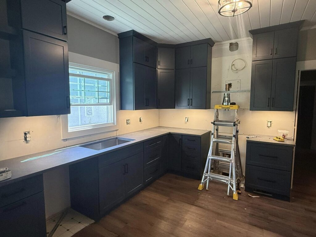 Electric vehicle charger installation on a brick wall by Power'd Up Electric, LLC in Clinton, TN.