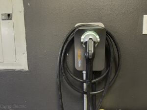 An EV charging station installation next to an electrical panel by Elving Electric in Marysville, WA