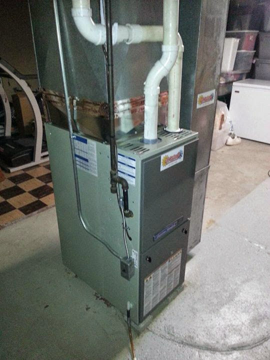 An existing furnace system with ductwork in a basement by Complete Comfort Heating & Cooling in Kenosha, WI.