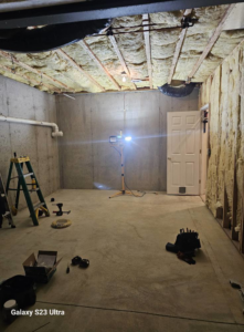 Exposed HVAC ductwork in a basement during a project by JRD Refrigeration LLC in York, PA.